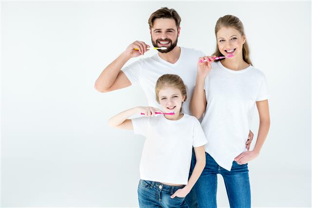 family-with-toothbrushes